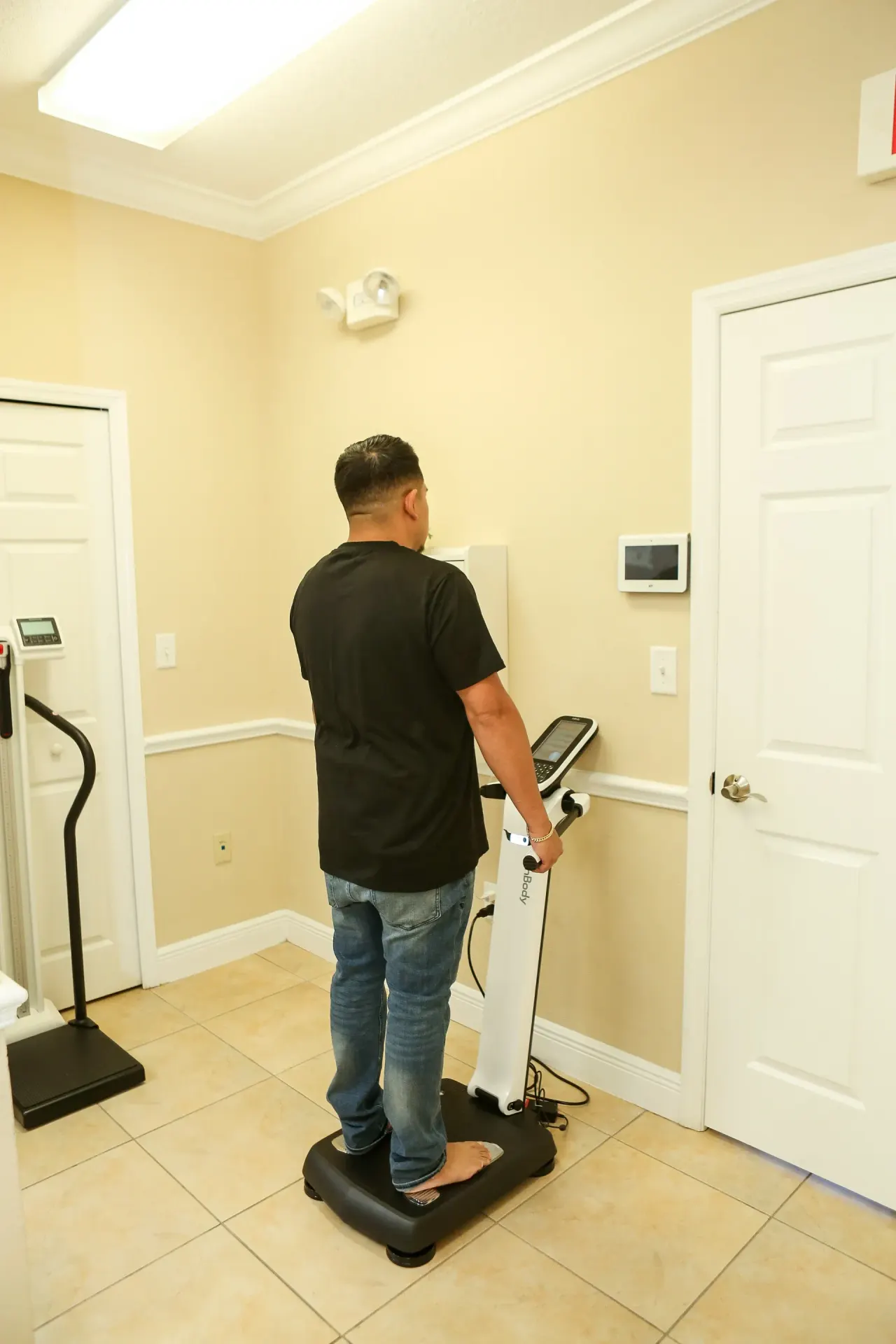 Confident adult patient after reviewing InBody scan results at Advanced Optimal Healthcare in Lutz, FL